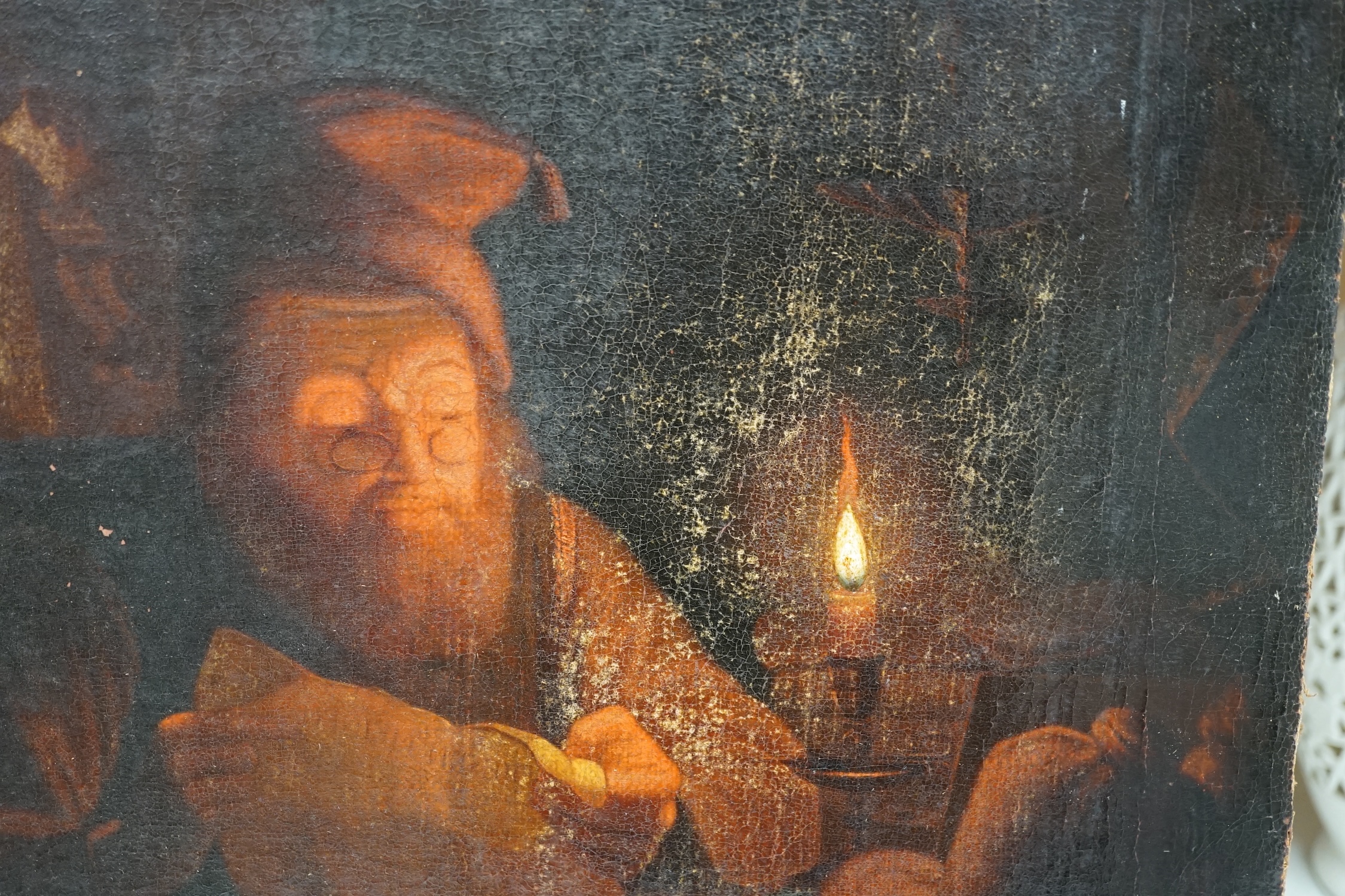 After Godfried Schalcken (Dutch, 1643-1706), oil on canvas, Gentleman reading by candlelight, unsigned, 44 x 37cm, unframed. Condition - poor to fair